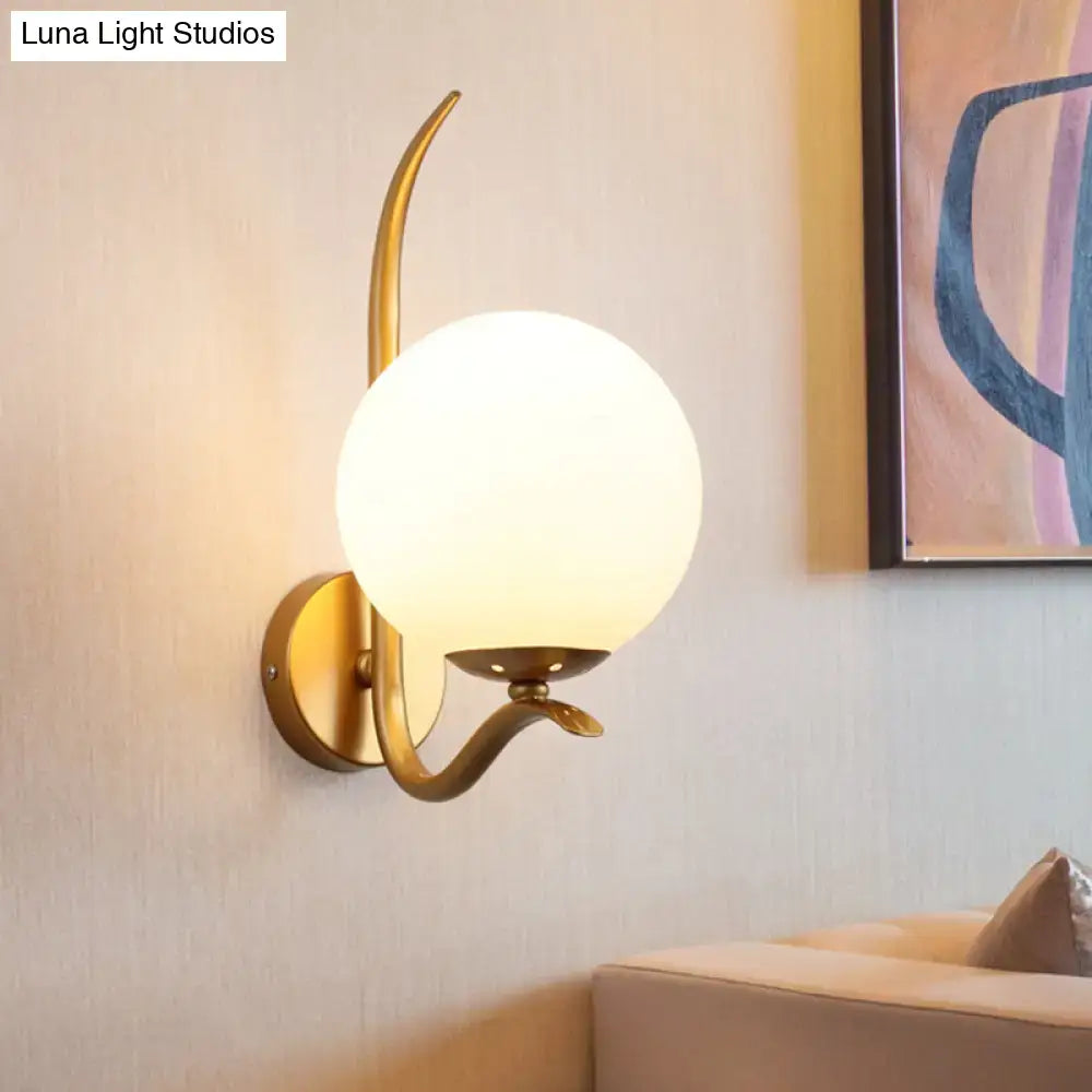 Modernist gold and white glass sconce light for bedroom