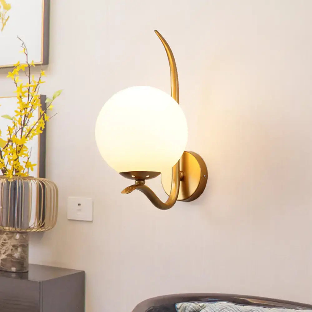 Modernist gold and white glass sconce light for bedroom