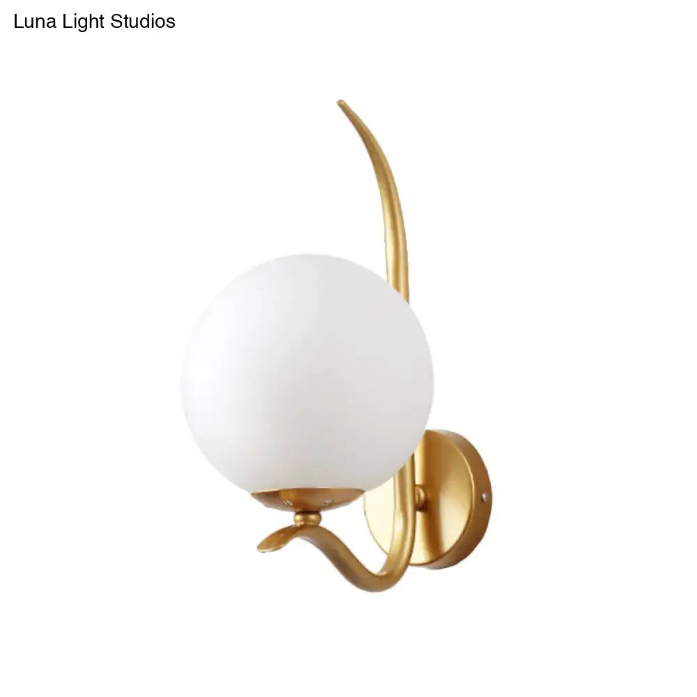 Modernist gold and white glass sconce light for bedroom