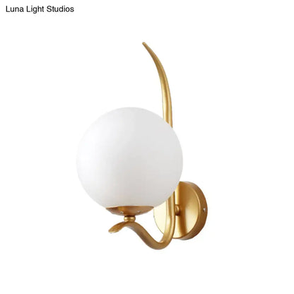 Modernist gold and white glass sconce light for bedroom
