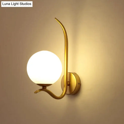 Modernist gold and white glass sconce light for bedroom