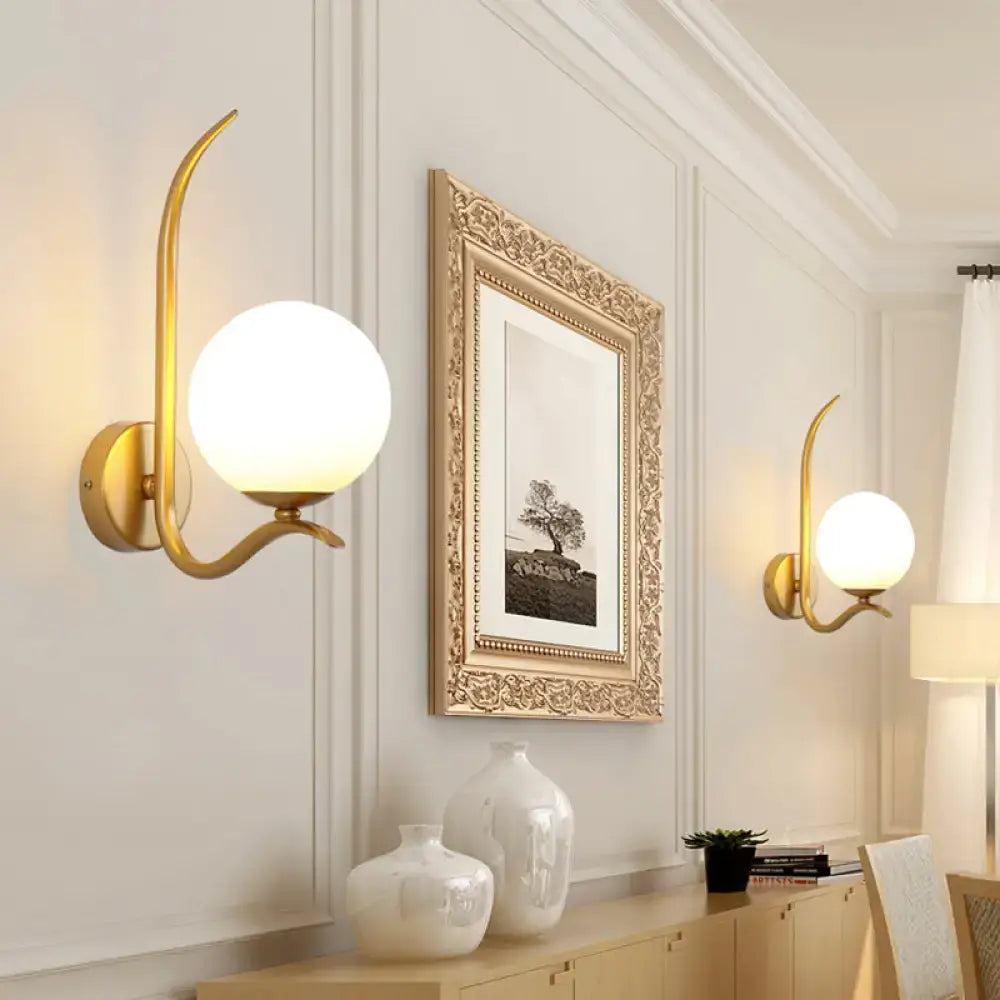 Modernist gold and white glass sconce light for bedroom