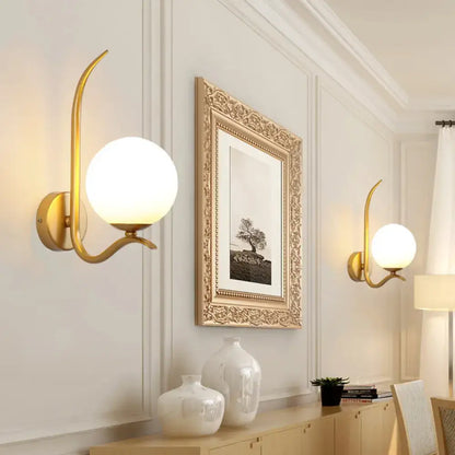 Modernist gold and white glass sconce light for bedroom