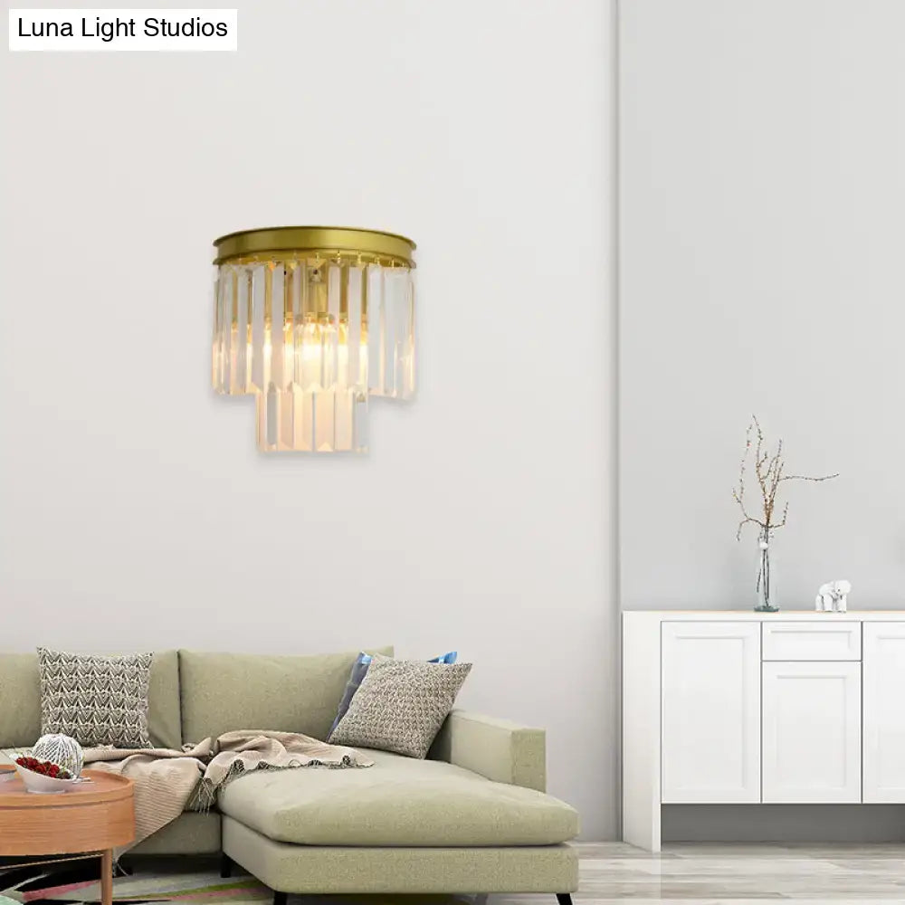 Modernist gold wall lamp with clear faceted crystal for living room