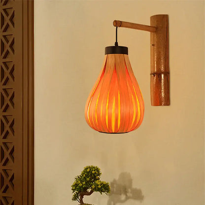 Modernist orange wood slat wall sconce – foyer bamboo lantern
