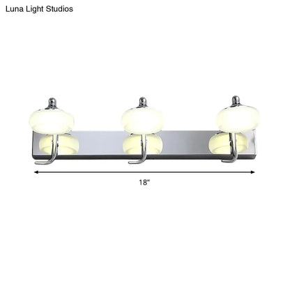 Modernist silver bathroom vanity light with frosted acrylic shades