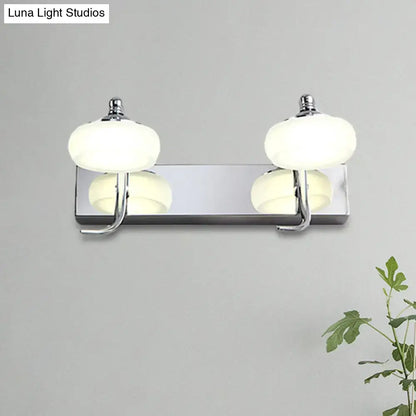 Modernist silver bathroom vanity light with frosted acrylic shades