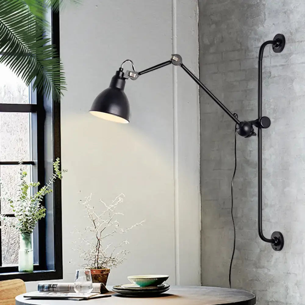 Modernist style black & white adjustable wall light dining room