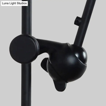 Modernist style black & white adjustable wall light dining room