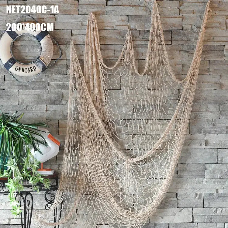 Nautical deep blue decorative fishing net with seashells bedroom decor