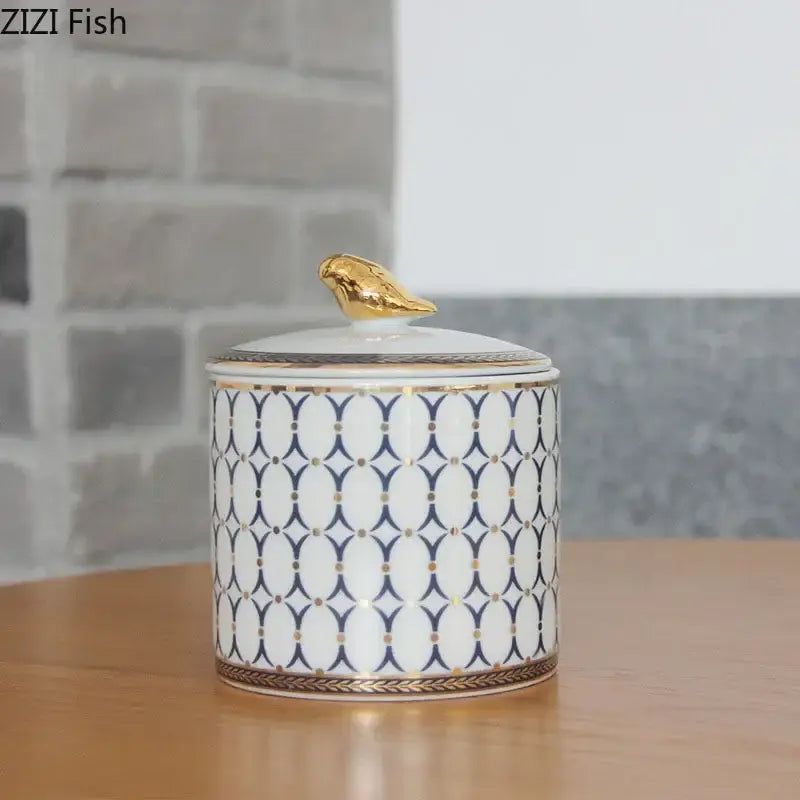 Navy and white geometric storage jar with gold plated bird bedroom decor