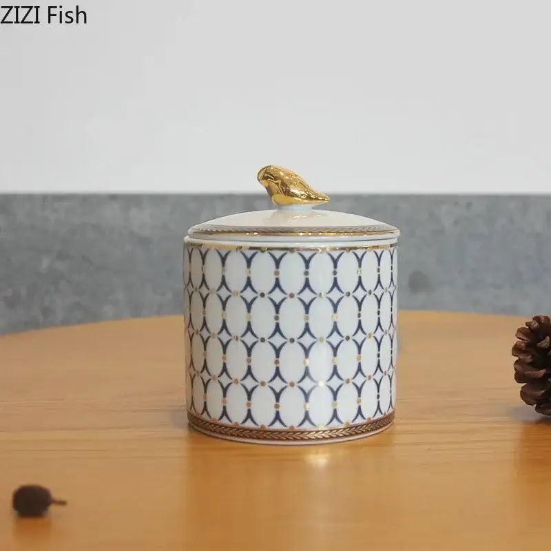 Navy and white geometric storage jar with gold plated bird bedroom decor
