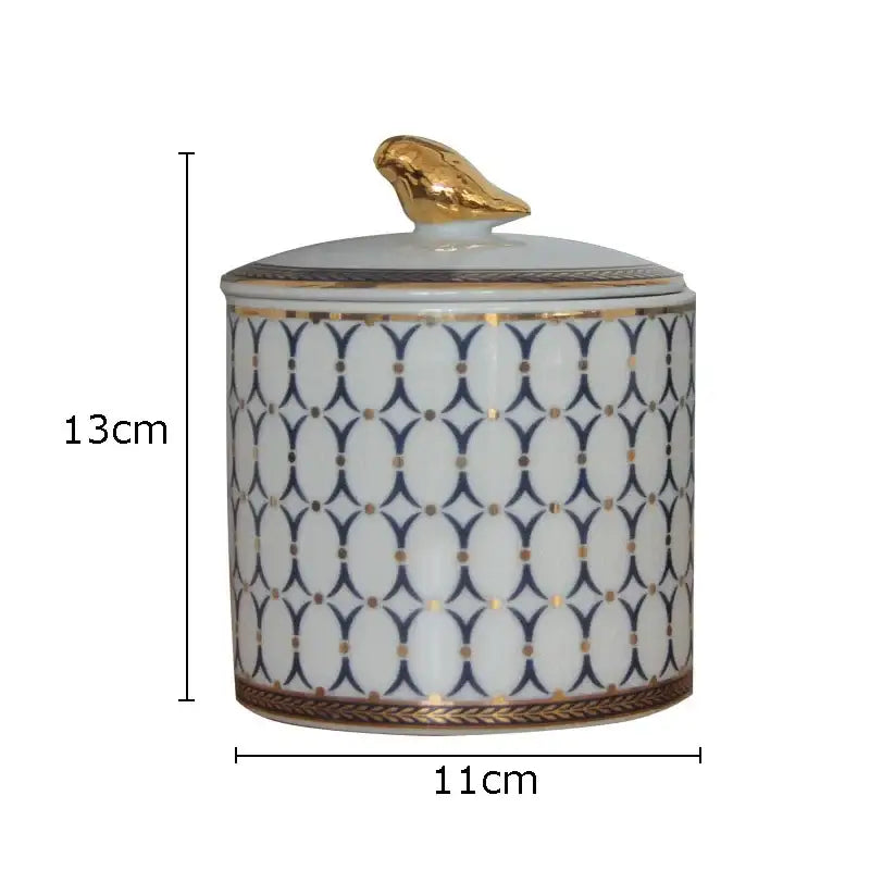Navy and white geometric storage jar with gold plated bird bedroom decor