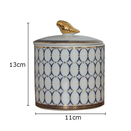 Navy and white geometric storage jar with gold plated bird bedroom decor