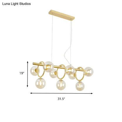 DecorBites™ Nordic Style Gold Pendant Light with Clear/Cognac Glass - Bubble Island Lighting, 9 Lights