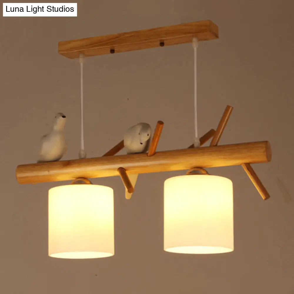 DecorBites™ Nordic Wood Pendant Light with Opal Glass Cylinder and Resin Bird Decor
