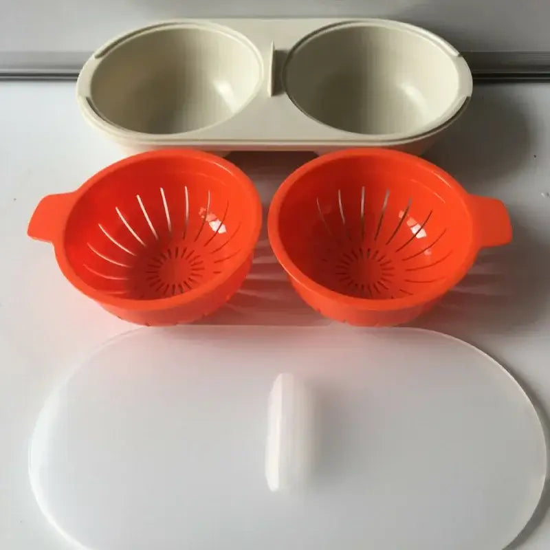 Orange and white egg boiler steamer double cup kitchen separator