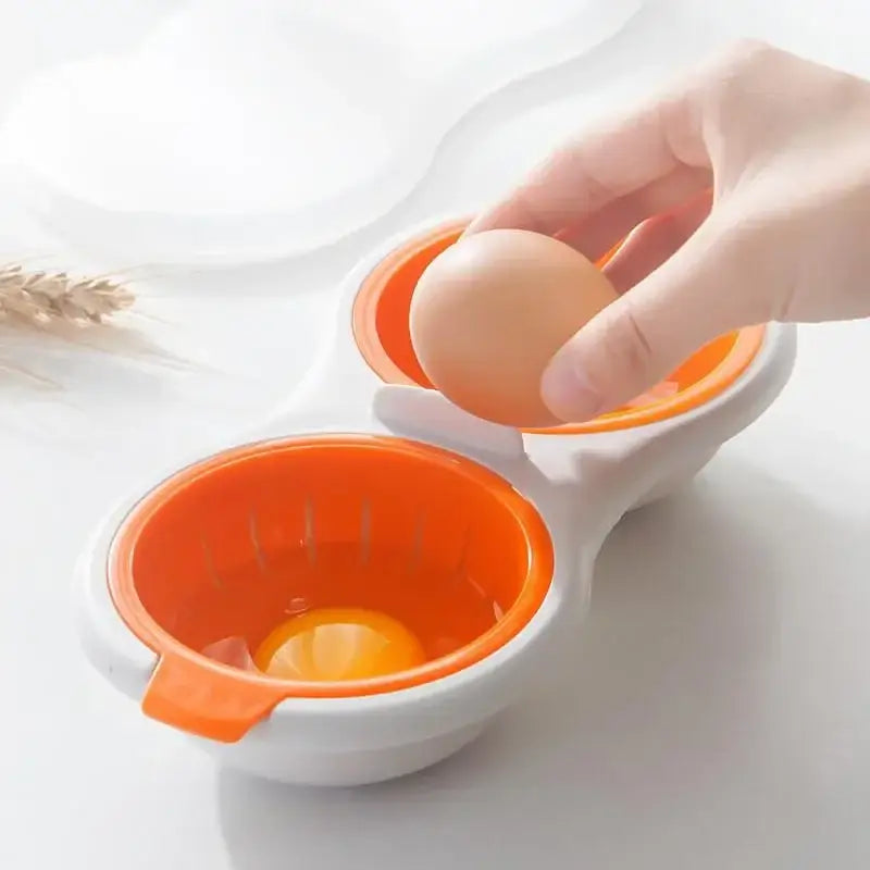 Orange and white egg boiler steamer double cup kitchen separator