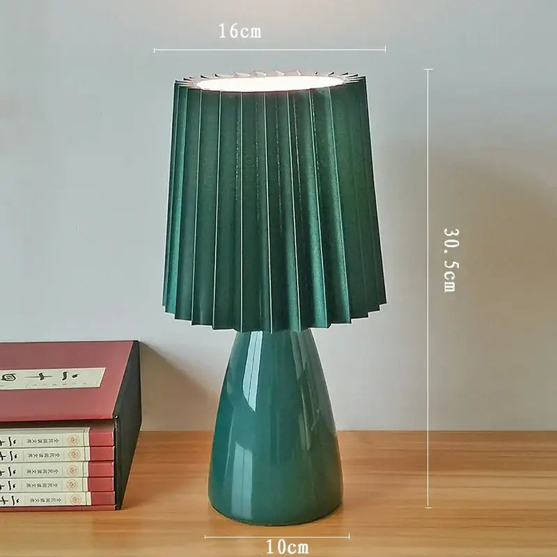 Orange ceramic milkshake bedside lamp with pleated shade for bedroom