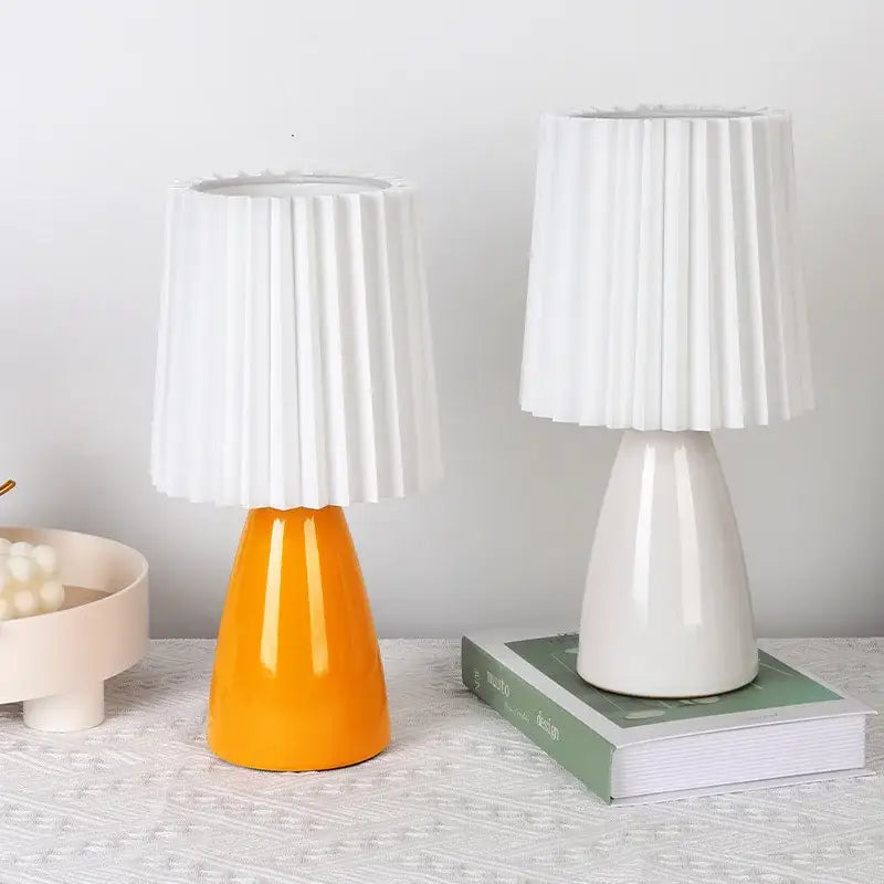 Orange ceramic milkshake bedside lamp with pleated shade for bedroom