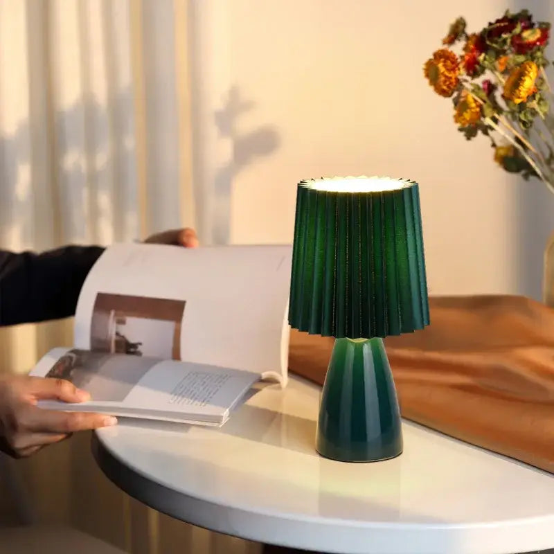 Orange ceramic milkshake bedside lamp with pleated shade for bedroom