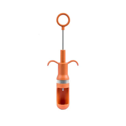 Orange metal cherry pitter fruit core remover kitchen tool