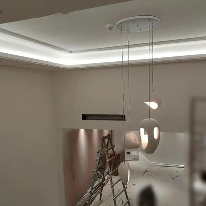 Organic gray textured stone pendant lights – dining room led