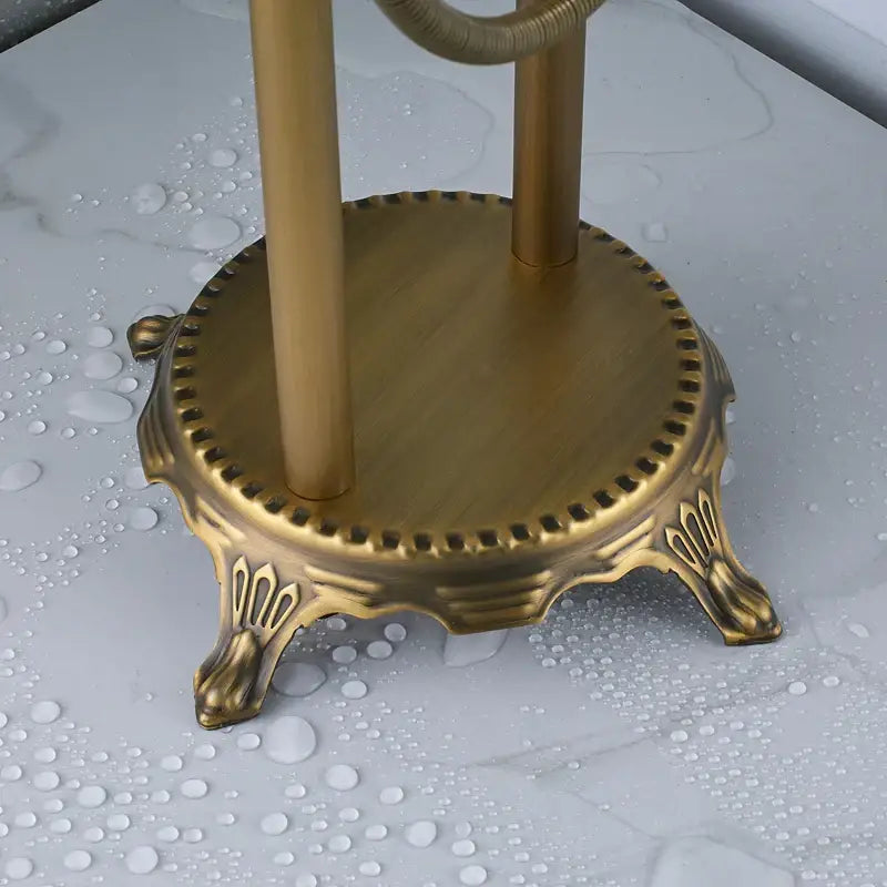 Ornate antique brass freestanding bathtub filler with handshower bathroom