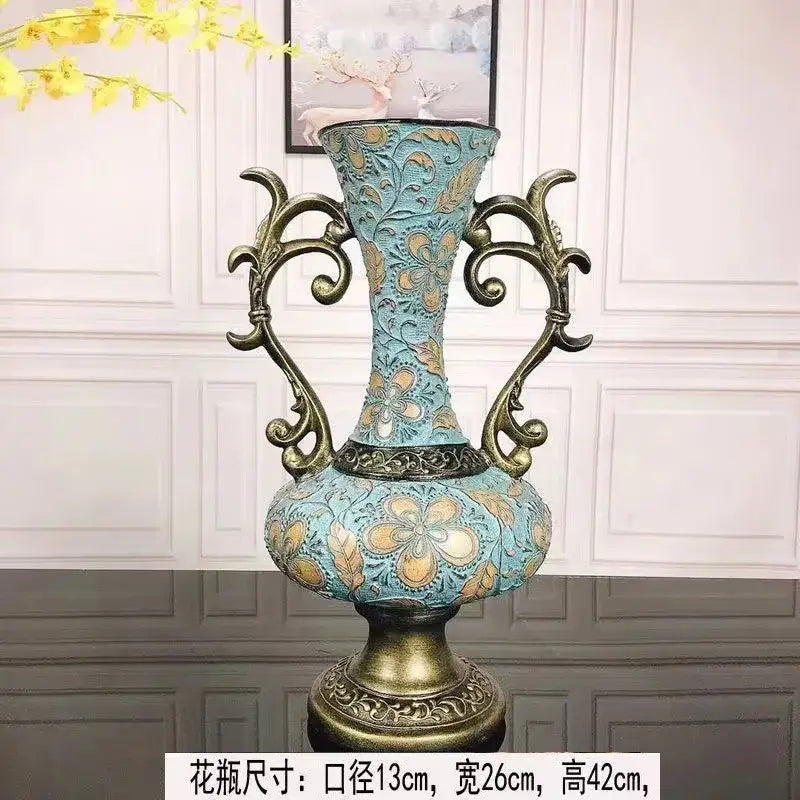 Ornate black & gold resin vase dried flowers – living room decor