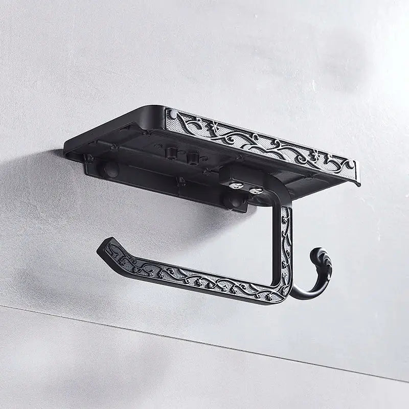 Ornate black metal toilet paper holder with phone shelf bathroom storage