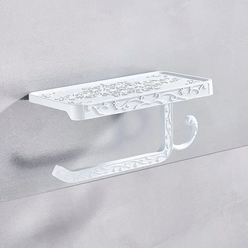 Ornate black metal toilet paper holder with phone shelf bathroom storage