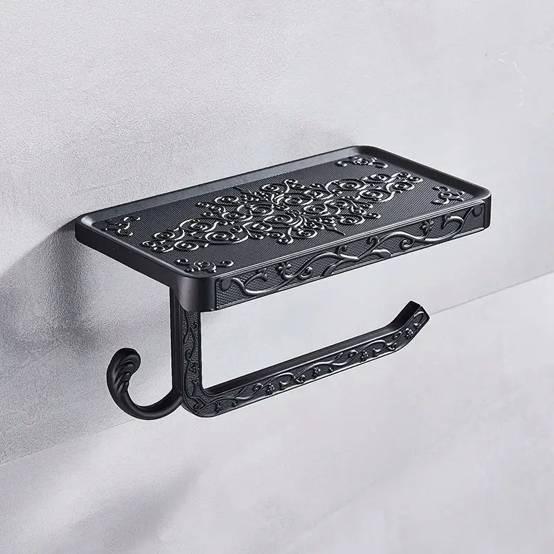 Ornate black metal toilet paper holder with phone shelf bathroom storage