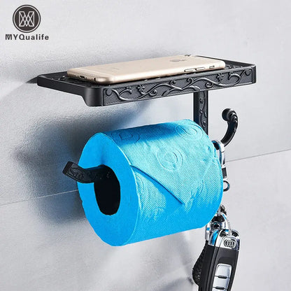 Ornate black metal toilet paper holder with phone shelf bathroom storage