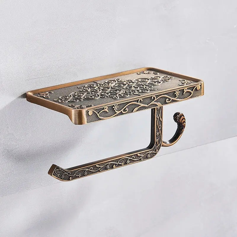 Ornate black metal toilet paper holder with phone shelf bathroom storage