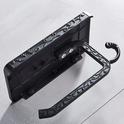 Ornate black metal toilet paper holder with phone shelf bathroom storage