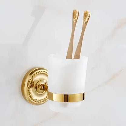 Ornate brass gold bathroom hardware set with towel rack and hooks