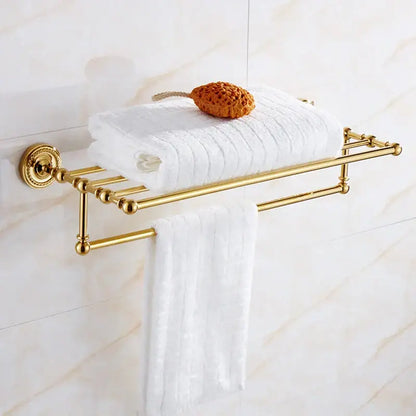 Ornate brass gold bathroom hardware set with towel rack and hooks
