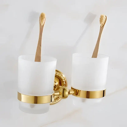 Ornate brass gold bathroom hardware set with towel rack and hooks
