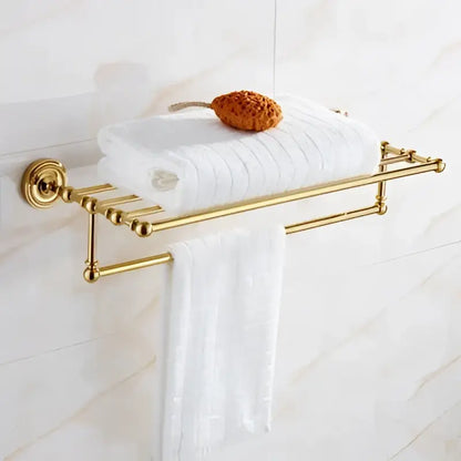 Ornate brass gold bathroom hardware set with towel rack and hooks