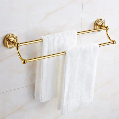Ornate brass gold bathroom hardware set with towel rack and hooks