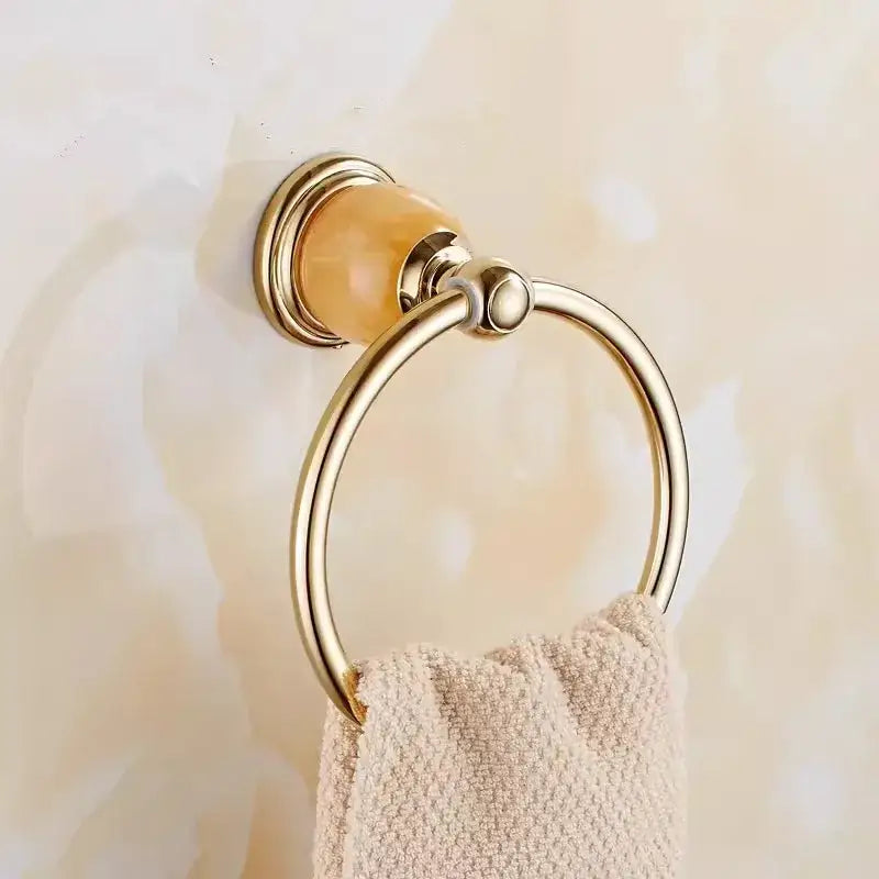 Ornate brass jade bathroom accessories set with amber accents
