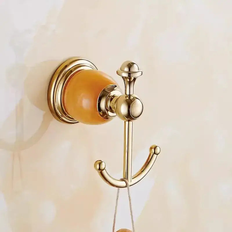 Ornate brass jade bathroom accessories set with amber accents