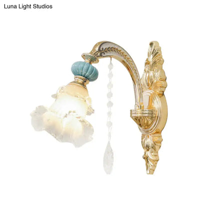Ornate gold and blue glass wall mount light bedroom sconce