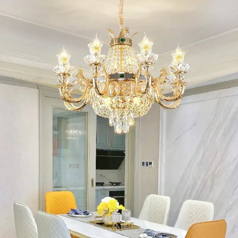 Ornate gold crystal dining room chandelier with green accent stone
