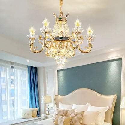 Ornate gold crystal dining room chandelier with green accent stone