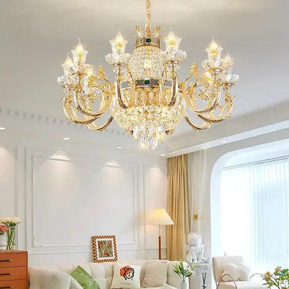 Ornate gold crystal dining room chandelier with green accent stone