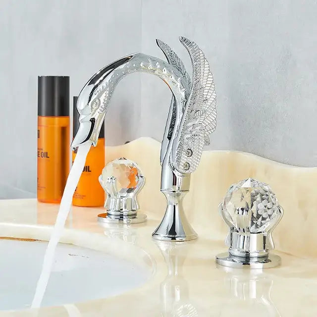 Ornate gold swan basin faucet with crystal handles for bathroom