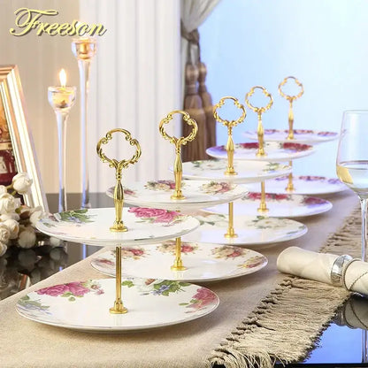 Ornate gold three tiered floral fruit plates set dining room stand