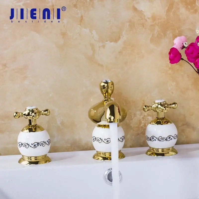 Ornate gold & white porcelain bathroom faucet set