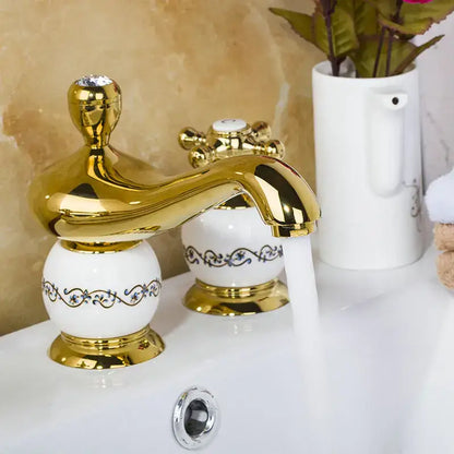 Ornate gold & white porcelain bathroom faucet set